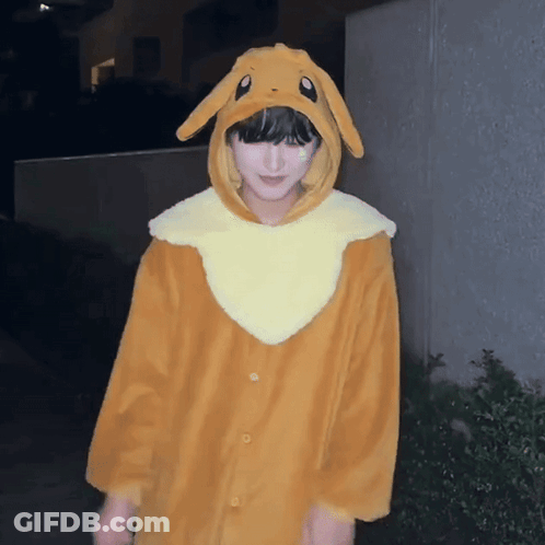 A Person Wearing A Bunny Costume With A Hood And Ears GIF