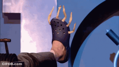 A Person Wearing A Croc With A BBC Logo On The Bottom Right GIF