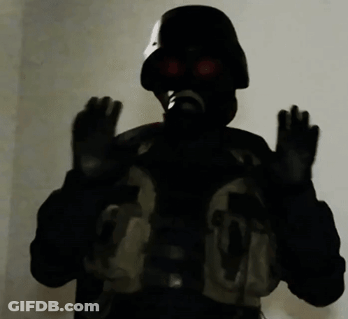 A Person Wearing A Gas Mask Has The Number 36 On Their Chest GIF