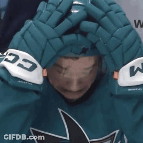 A Person Wearing A Helmet And Gloves That Say Ccm On Them GIF
