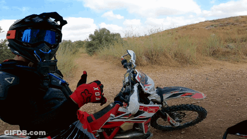 Person Wearing Fox Helmet And Gloves Giving Thumbs Up GIF