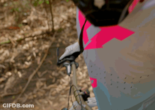 A Person Wearing A Helmet And Goggles With The Fox Logo On It GIF