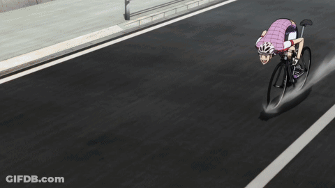 A Person Wearing A Helmet Is Riding A Bike With The Word Fuji On The Shorts GIF