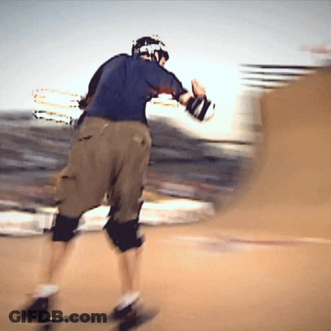 A Person Wearing A Helmet Is Riding A Skateboard GIF