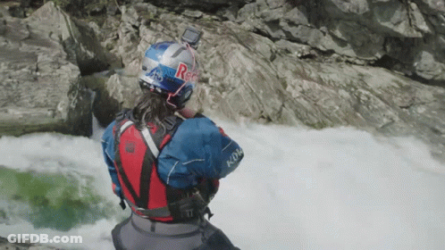 A Person Wearing A Helmet That Says Redbull On It GIF