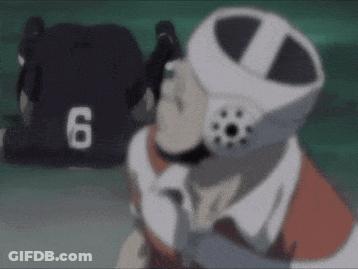 A Person Wearing A Helmet With The Number 6 On It Is Talking On A Cell Phone . GIF