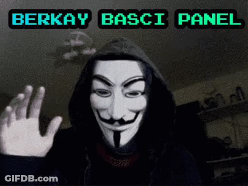 A Person Wearing A Hooded Anonymous Mask With The Words Berkay Basci Panel Behind Him GIF