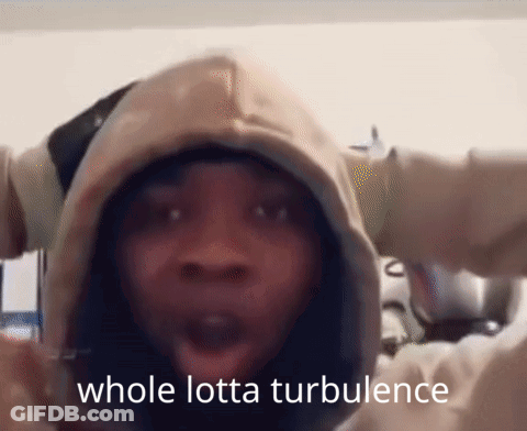 A Person Wearing A Hoodie With The Words Whole Lotta Turbulence On The Bottom GIF