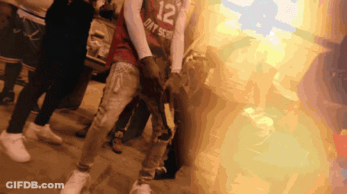 A Person Wearing A Jersey That Says 12 On It GIF