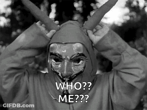 A Person Wearing A Mask And A Hood Says Who Me GIF