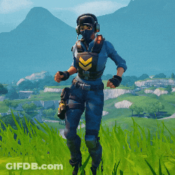A Person Wearing A Mask And Headphones Standing In A Field GIF