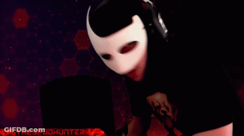 A Person Wearing A Mask And Headphones With The Words " Thespudhunter " Below Them GIF
