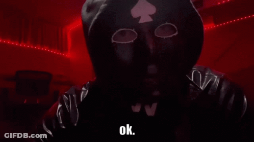 A Person Wearing A Mask With A Spade On It Says " Ok " GIF