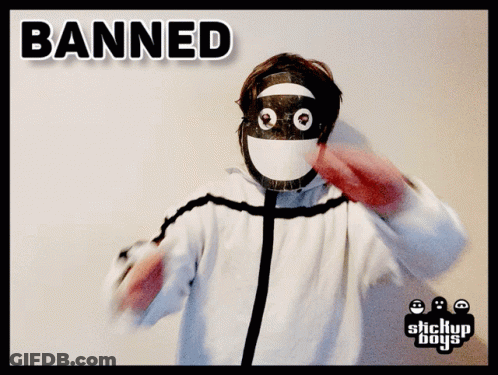 A Person Wearing A Mask With The Word Banned Written On It GIF