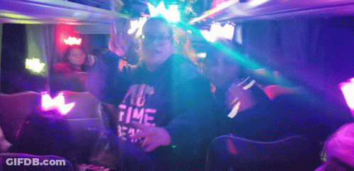 A Person Wearing A No Time Shirt Is Dancing In A Club GIF