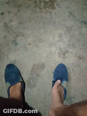 A Person Wearing A Pair Of Blue Shoes GIF