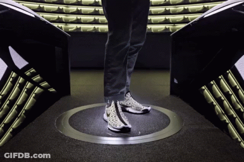 A Person Wearing A Pair Of Nike Shoes Is Standing In A Circle GIF