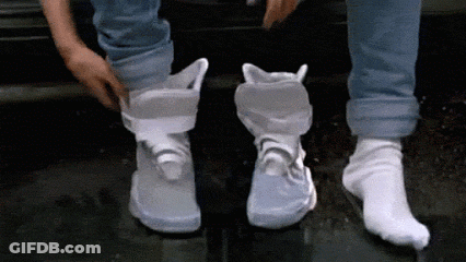 A Person Wearing A Pair Of White Shoes And White Socks GIF