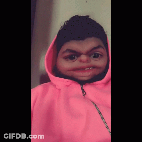 A Person Wearing A Pink Hoodie With A Zipper On The Front GIF