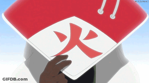 A Person Wearing A Red And White Hat With A Red Symbol On It GIF