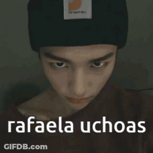 A Person Wearing A Red Hat And A White Shirt With The Words Rafaela Uchas Written On It GIF