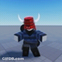 A Person Wearing A Red Hat With Horns On Their Head Is Standing In The Snow . GIF