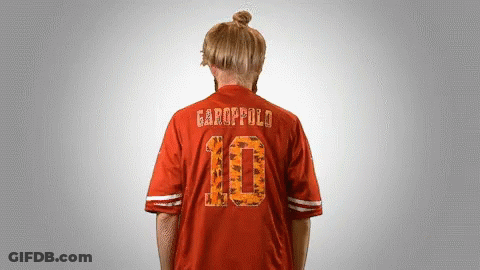 A Person Wearing A Red Jersey With The Number 10 On It GIF