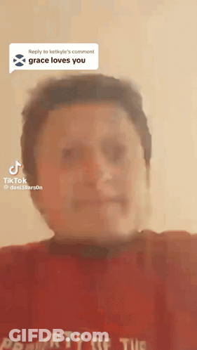 A Person Wearing A Red Shirt That Says Property Of The United States GIF