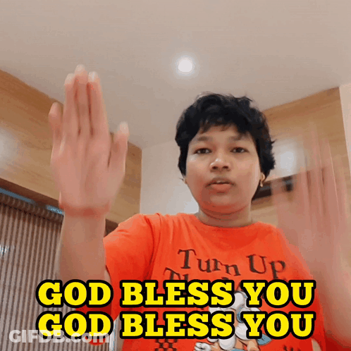 A Person Wearing A Red Shirt That Says Turn Up And Says God Bless You GIF