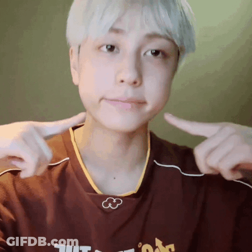 A Person Wearing A Shirt That Says ' Ucsd ' On The Front GIF