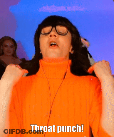 A Person Wearing A Turtleneck Sweater And Glasses Says Throat Punch GIF