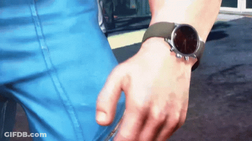 A Person Wearing A Watch On Their Wrist That Shows The Time As 7:15 GIF
