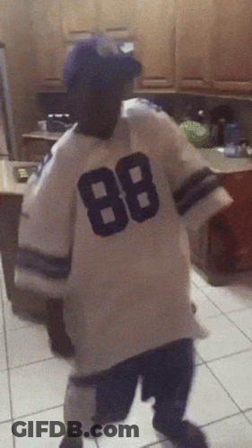 A Person Wearing A White Jersey With The Number 88 On It GIF