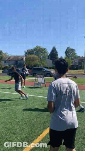 A Person Wearing A White Shirt That Says ' Rugby ' On The Back GIF