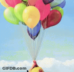 A Person Wearing A Yellow Hat Is Holding A Bunch Of Balloons GIF