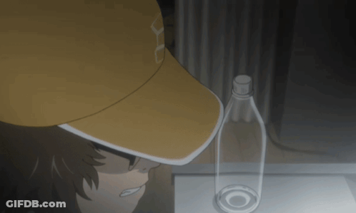 A Person Wearing A Yellow Hat With The Letter U On It GIF