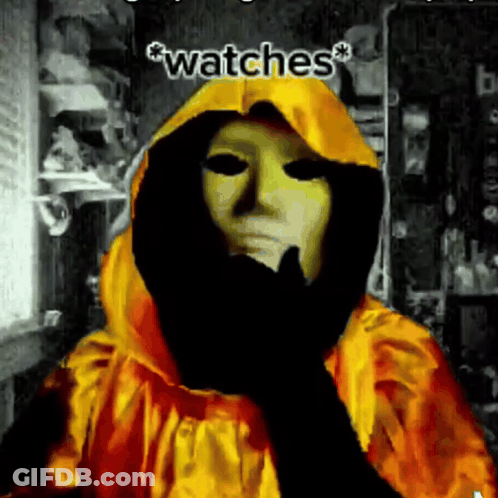 A Person Wearing A Yellow Hooded Jacket With The Words Watches Written On The Bottom GIF