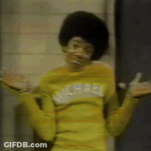 A Person Wearing A Yellow Shirt With The Word Free On The Front GIF