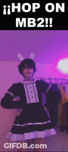 A Person Wearing Bunny Ears And A Maid Dress With The Words Hop On Mb2 Written On The Bottom GIF
