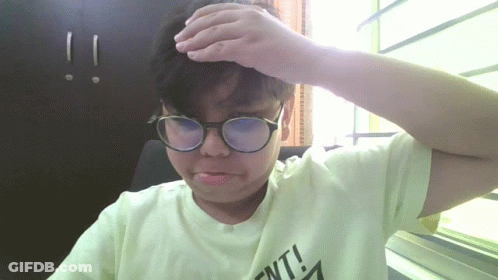A Person Wearing Glasses And A Shirt That Says " Ent " GIF