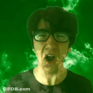 A Person Wearing Glasses Covering Their Mouth With Their Hand GIF