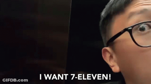 A Person Wearing Glasses Is Saying I Want 7 Eleven GIF