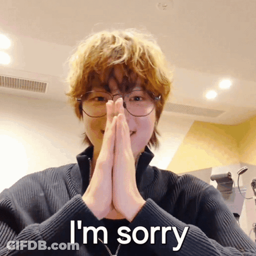 A Person Wearing Glasses Says I 'M Sorry GIF