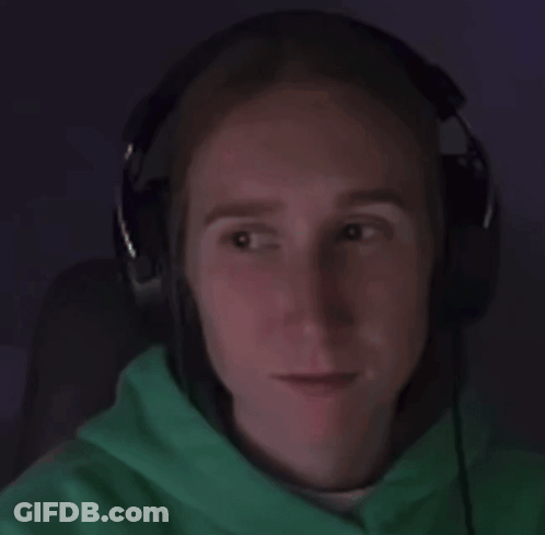A Person Wearing Headphones And A Green Hoodie GIF