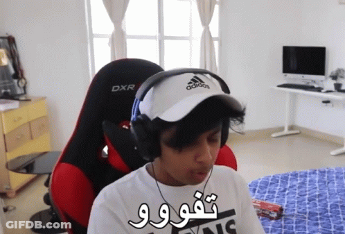 A Person Wearing Headphones And A Hat That Says Adidas On It GIF