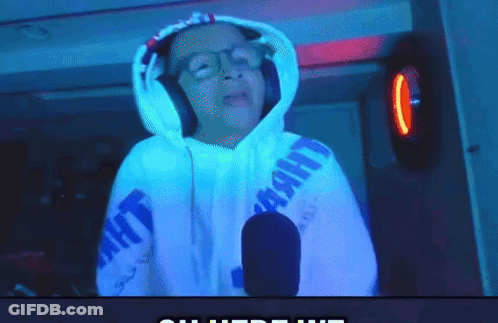 A Person Wearing Headphones And A Hoodie That Says Light GIF