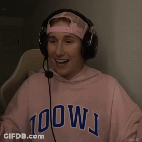 A Person Wearing Headphones And A Pink Hoodie That Says 100Wj On It GIF