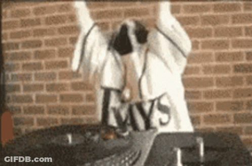 A Person Wearing Headphones And A Shirt That Says Rays GIF