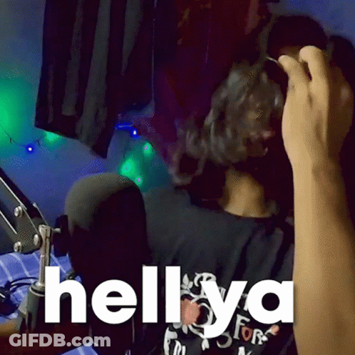 A Person Wearing Headphones With The Words Hell Ya On The Bottom GIF