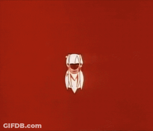 A Person Wearing Orange Gloves Is Pressing A Button GIF